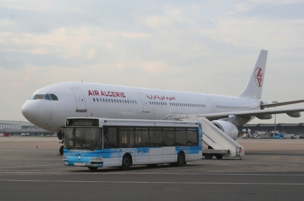 Compare the sizes
Air Algérie A330-200 waiting for its pax while an airport bus was standing before it

