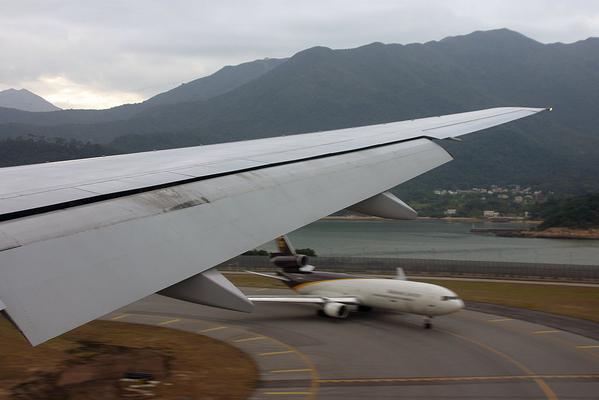 HKG, Hong-Kong
Short final RWY 25L with an UPS MD-11 and the beautiful Hong-Kong mountains in the background...
